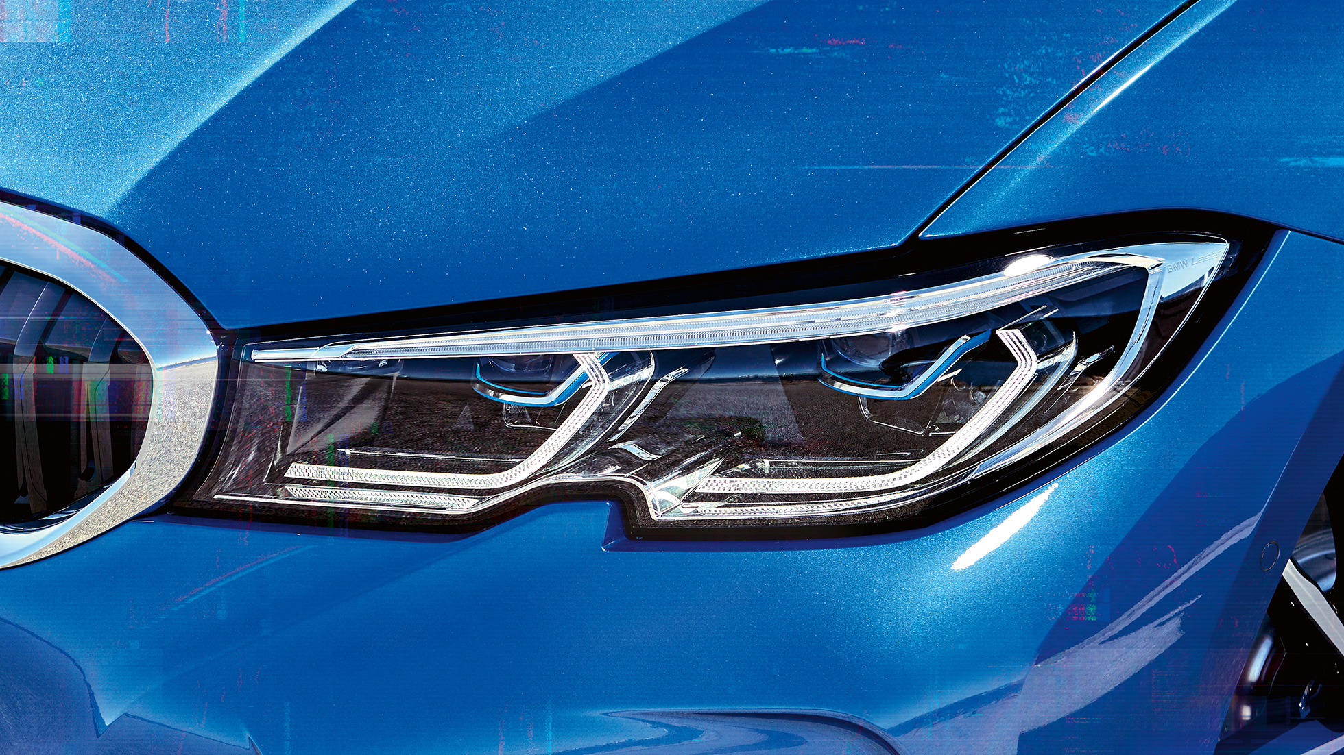 BMW radu 3 Sedan, BMW Laserlight. Bočný detailný pohľad na pravý predný svetlomet BMW Laserlight.