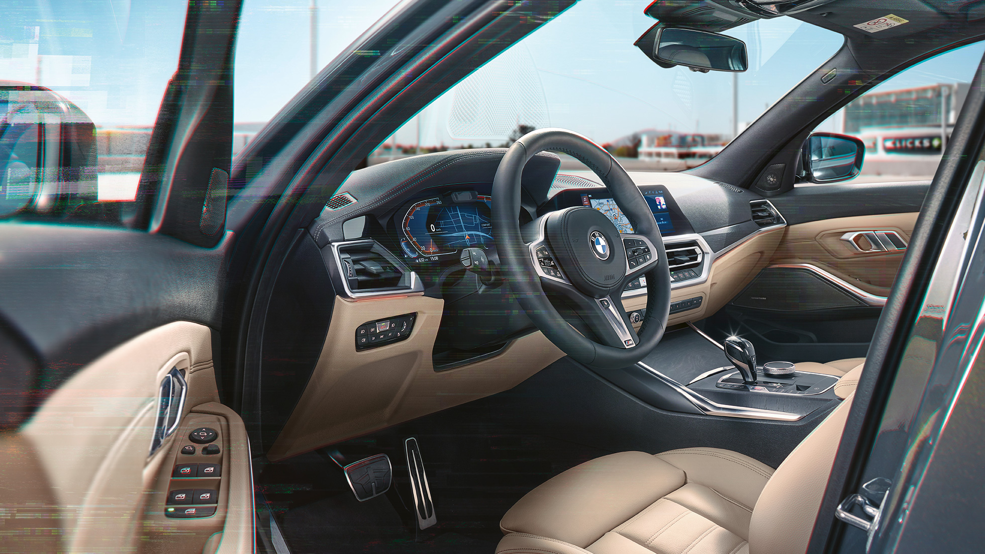 BMW radu 3 Touring, detailný pohľad na kokpit BMW radu 3 Touring, detailný pohľad na kokpit pred mestskou kulisou