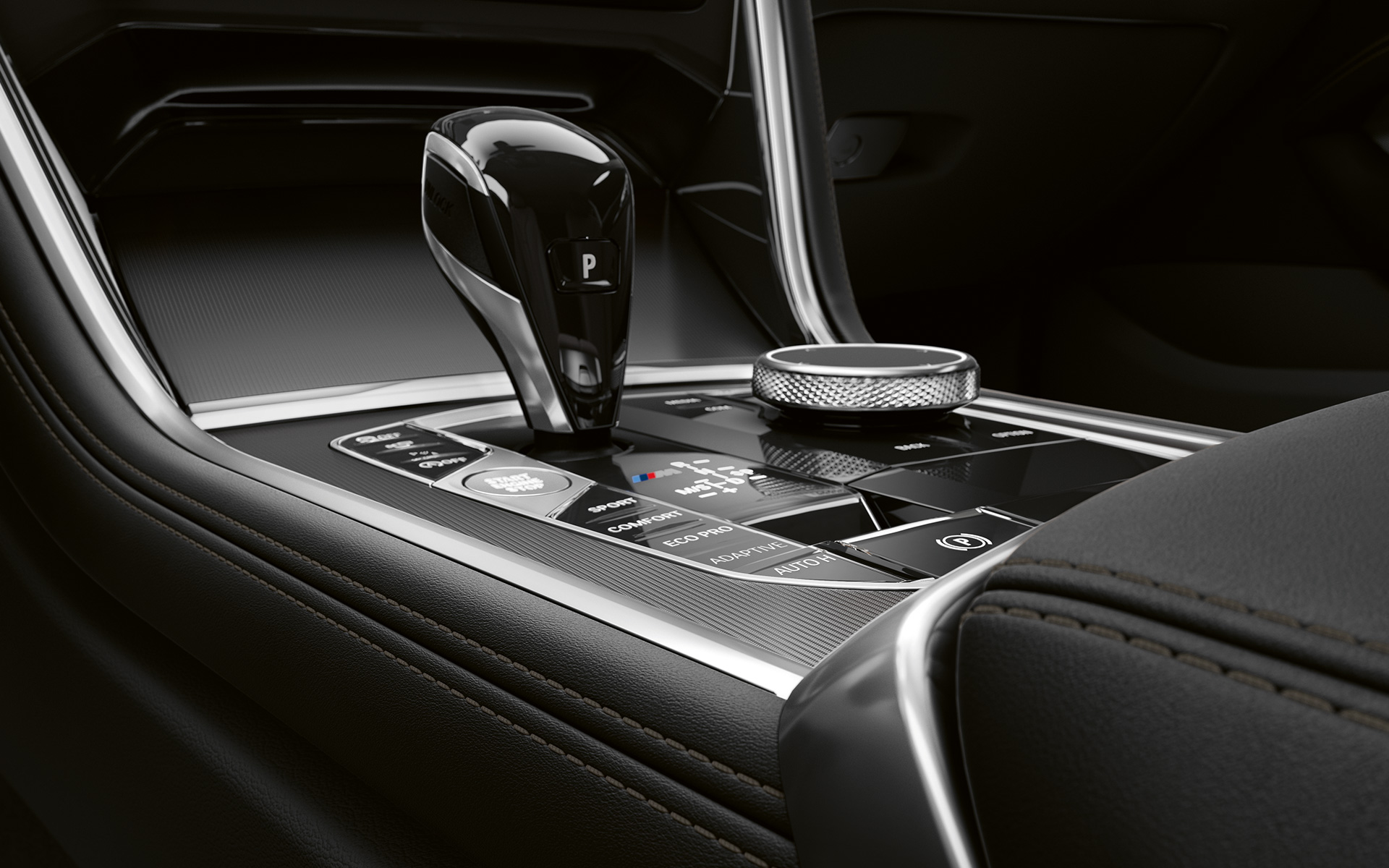 BMW radu 8 Coupé, stredová konzola Detail na stredovú konzolu BMW radu 8 Coupé.