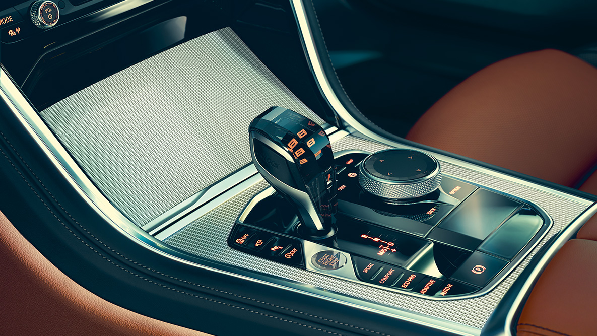 BMW radu 8 Coupé, sklenené aplikácie. Detailný pohľad na sklenené aplikácie v interiéri BMW radu 8 Coupé.