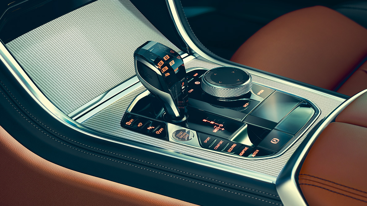 BMW radu 8 Coupé, stredová konzola. Detailný pohľad na interiér BMW radu 8 Coupé so zameraním na stredovú konzolu.