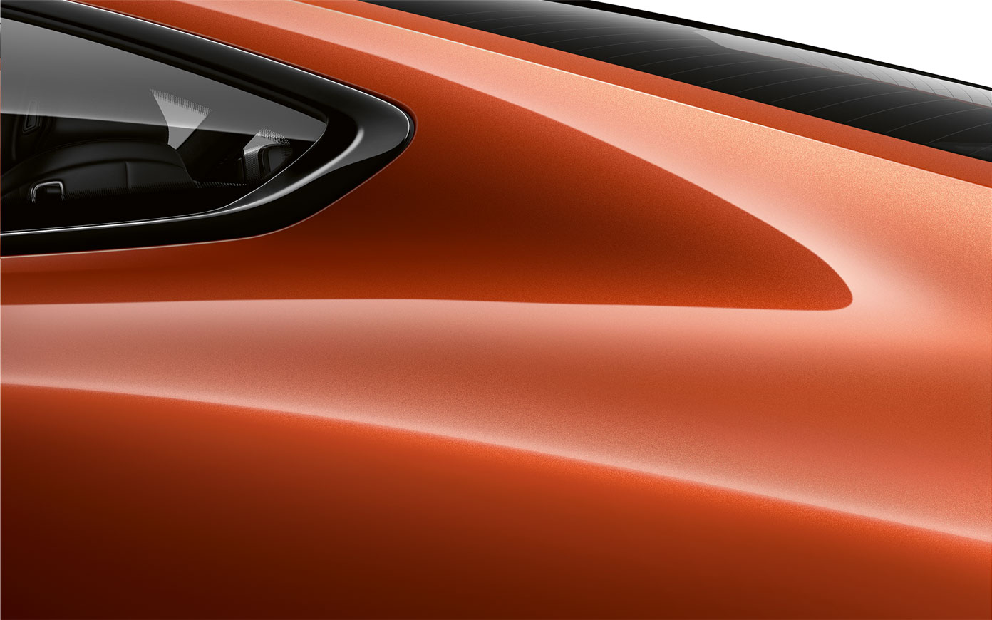BMW radu 8 Coupé, detailný pohľad na C-stĺpik. Detailný pohľad na C-stĺpik BMW radu 8 Coupé v metalíze Sunset Orange.