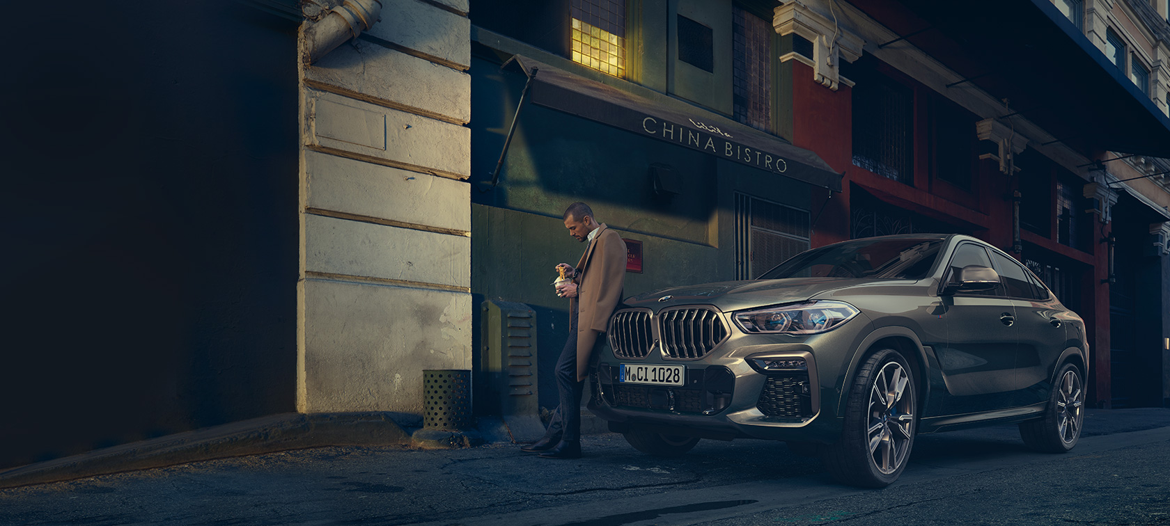 BMW X6 zadobočný pohľad jazdný BMW X6 G06 2019 metalíza Manhattan zadobočný pohľad jazdný