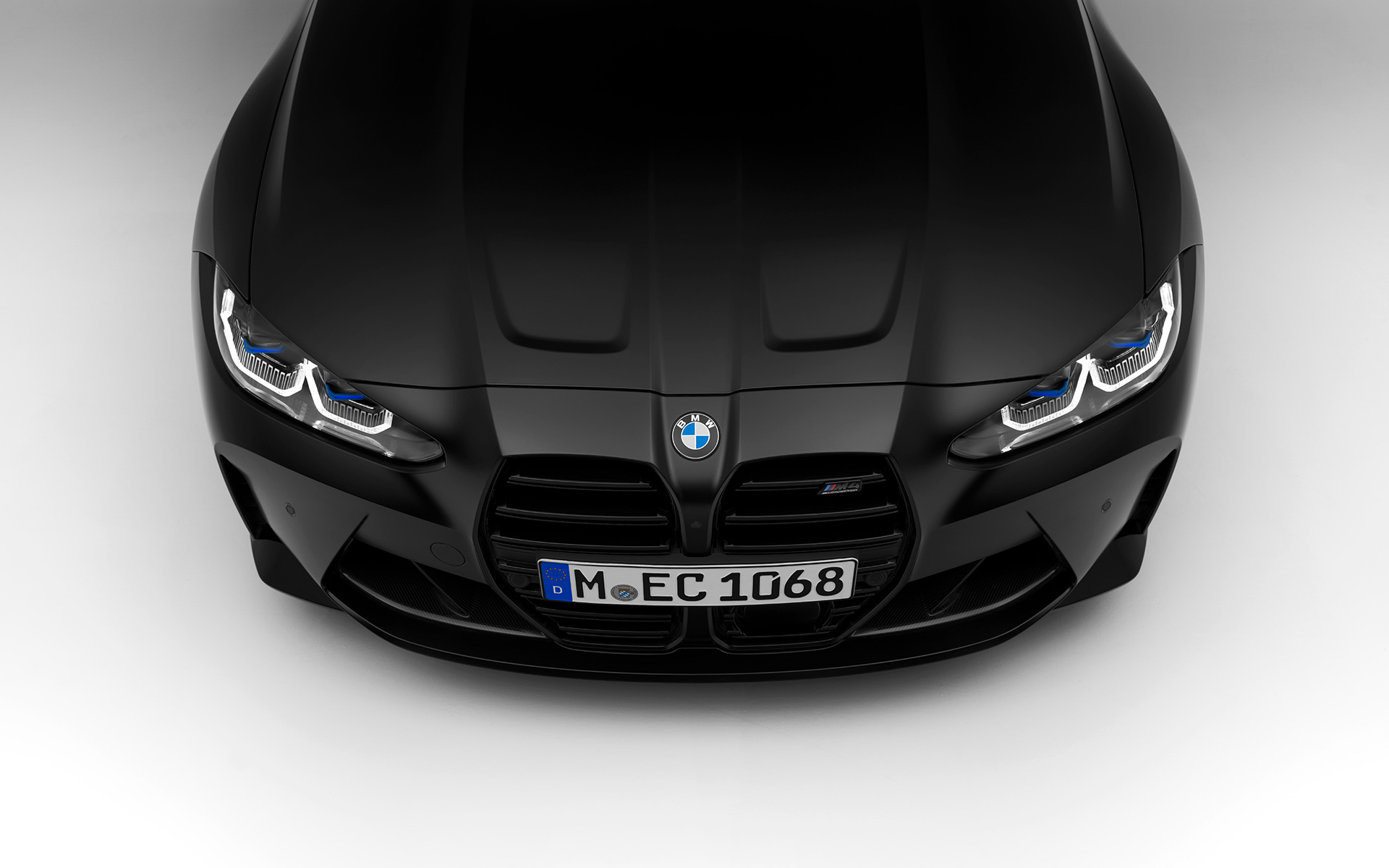 BMW M4 Competition Coupé G82 2021 BMW Individual metalíza Frozen Black predný pohľad BMW M4 Competition Coupé G82 2021 BMW Individual metalíza Frozen Black predný pohľad statický zhora