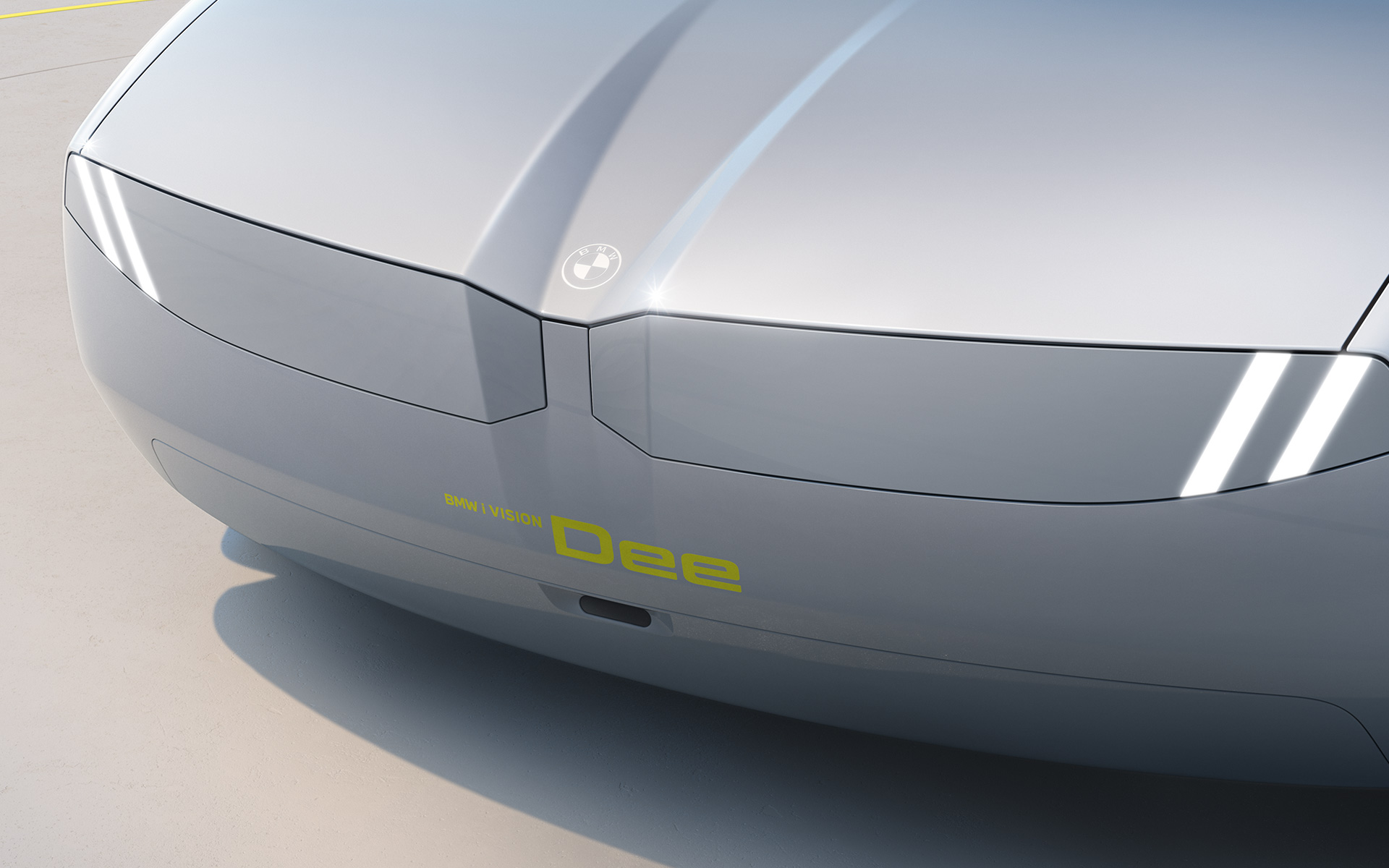 BMW i Vision Dee vizionárske vozidlo exteriér dizajn predný pohľad Predné svetlomety a BMW obličky tvoria jednoliaty grafický povrch.